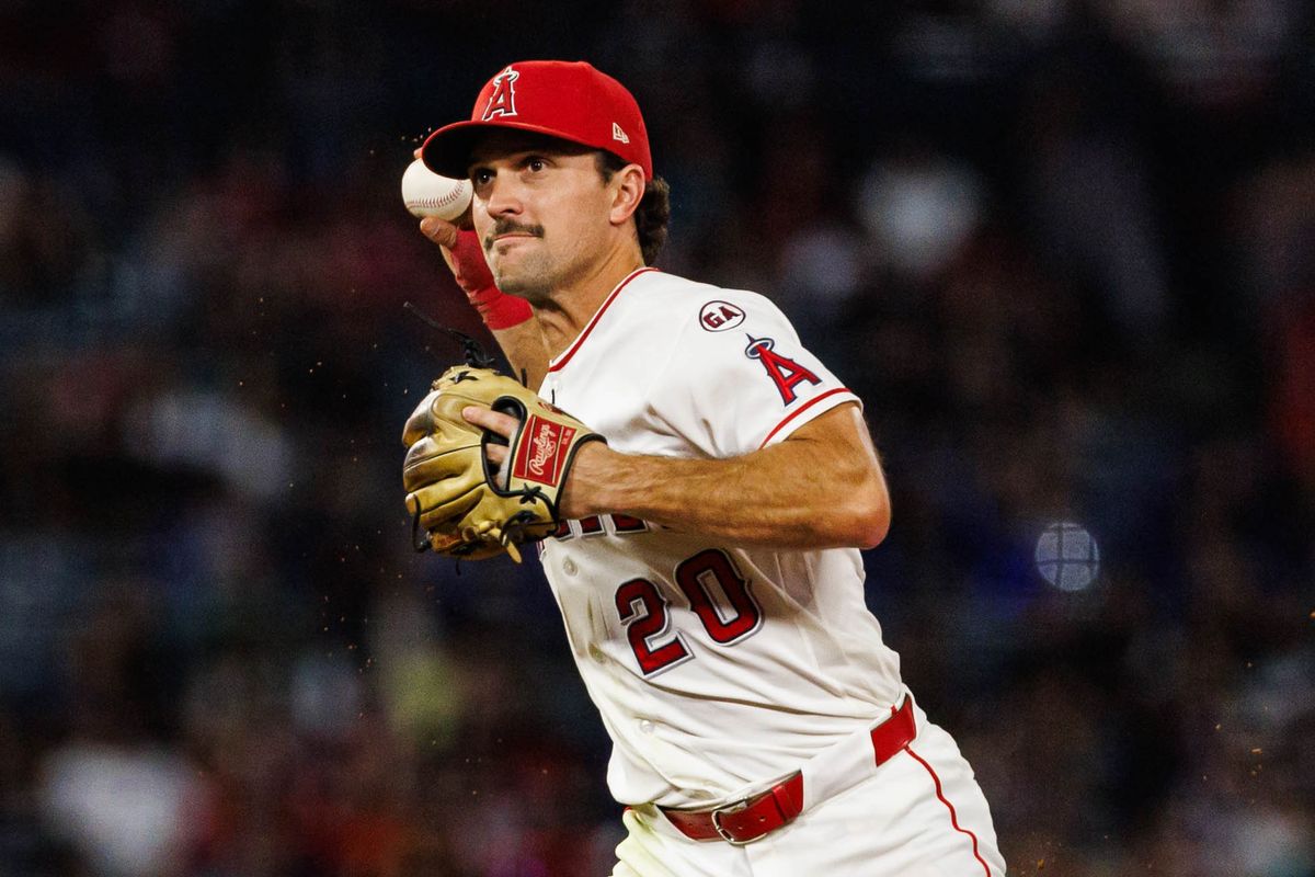 Adam Frazier #20 of the Los Angeles Angels throws the ball to first base during an MLB game against the Seattle Mariners on September 16, 2026 at Angel Stadium in Anaheim, California. Adam Frazier #20 of the Los Angeles Angels throws the ball to first base during an MLB game against the Seattle Mariners on September 16, 2026 at Angel Stadium in Anaheim, California.