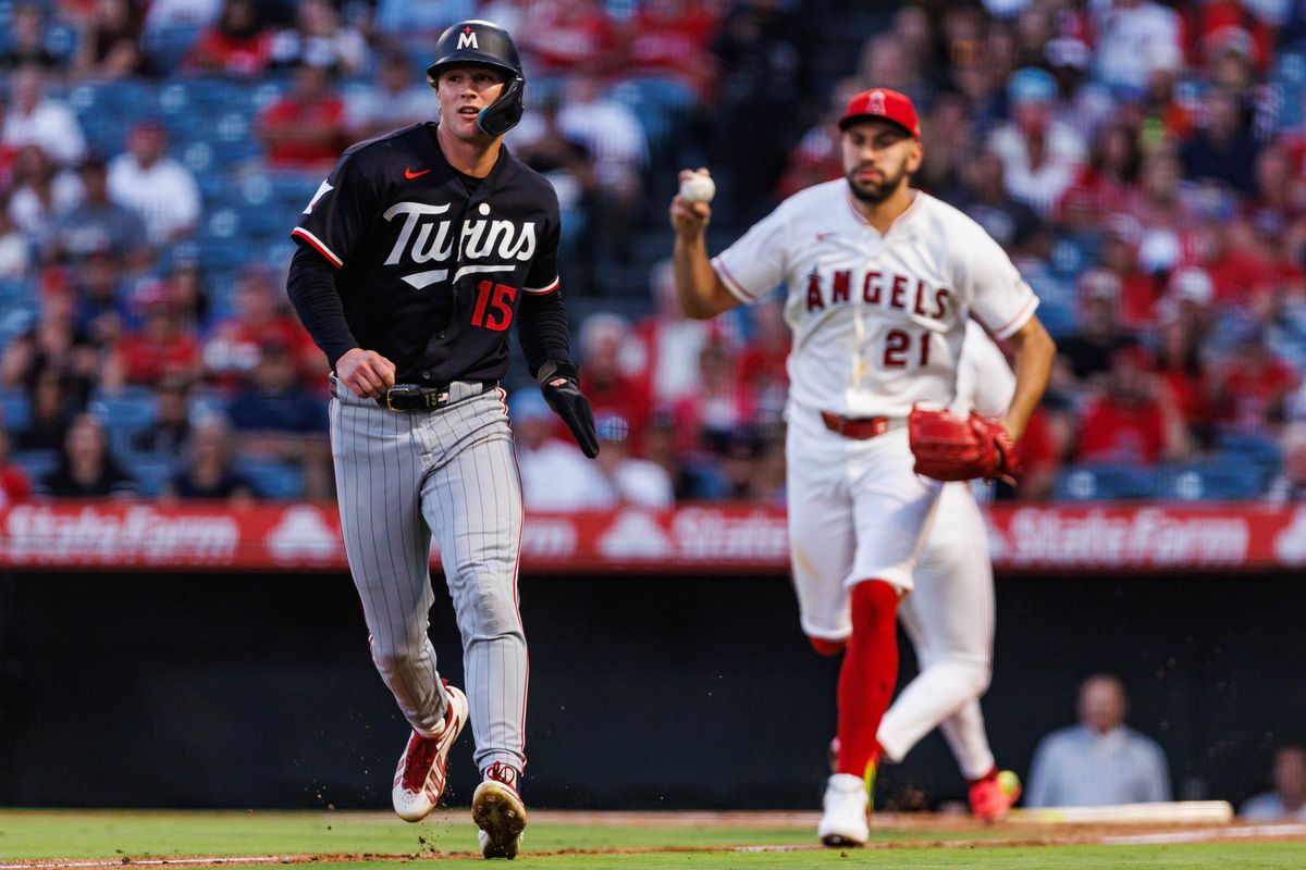 Luke Keaschall #15 of the Minnesota Twins is caught in a rundown during an MLB game against the Los Angeles Angels on September 18, 2026 at Angel Stadium in Anaheim, California. Luke Keaschall #15 of the Minnesota Twins is caught in a rundown during an MLB game against the Los Angeles Angels on September 18, 2026 at Angel Stadium in Anaheim, California.