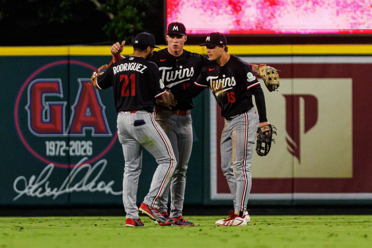 Minnesota Twins' outfielders celebrate after an MLB game against the Los Angeles Angels on September 18, 2026 at Angel Stadium in Anaheim, California. Minnesota Twins' outfielders celebrate after an MLB game against the Los Angeles Angels on September 18, 2026 at Angel Stadium in Anaheim, California.