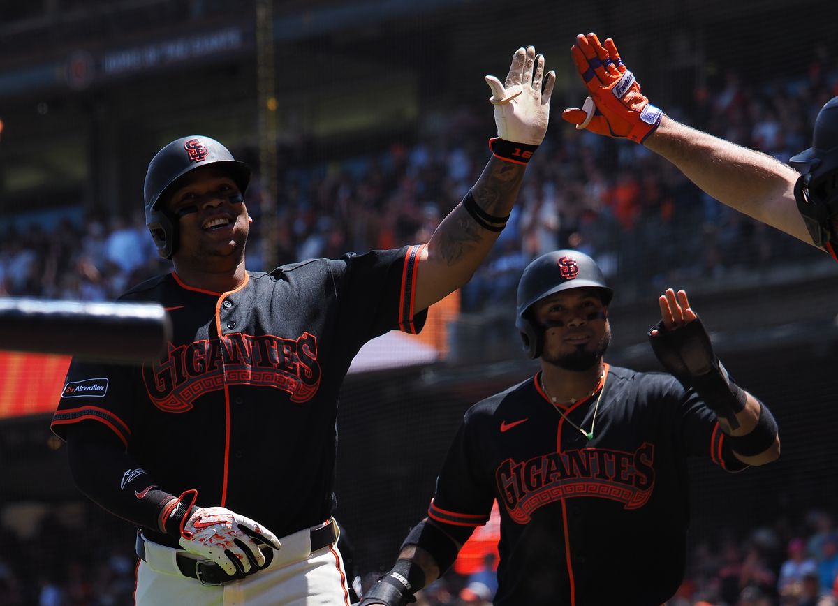 Jul 25, 2026; San Francisco, California, USA; San Francisco Giants first baseman Rafael Devers (16) celebrates with second baseman Luis Arraez (1) after batting him in on a three run home run against the Los Angeles Angels during the fourth inning at Oracle Park. Mandatory Credit: Kelley L Cox-Imagn Images Jul 25, 2026; San Francisco, California, USA; San Francisco Giants first baseman Rafael Devers (16) celebrates with second baseman Luis Arraez (1) after batting him in on a three run home run against the Los Angeles Angels during the fourth inning at Oracle Park. Mandatory Credit: Kelley L Cox-Imagn Images