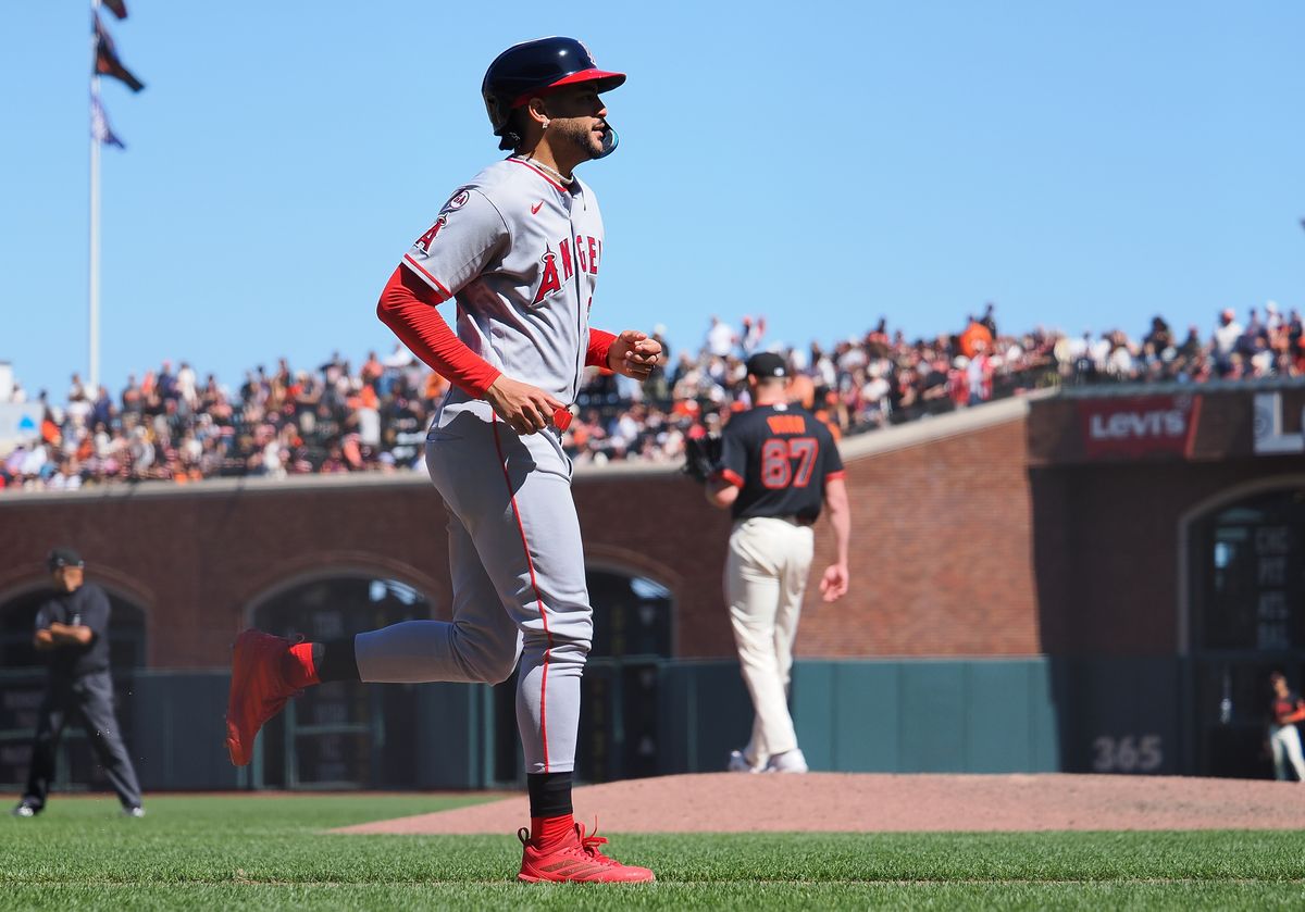 Jul 25, 2026; San Francisco, California, USA; Los Angeles Angels left fielder Jose Siri (28) is walked in after San Francisco Giants starting pitcher Keaton Winn (67) threw four balls for a walk with bases loaded during the ninth inning at Oracle Park. Mandatory Credit: Kelley L Cox-Imagn Images Jul 25, 2026; San Francisco, California, USA; Los Angeles Angels left fielder Jose Siri (28) is walked in after San Francisco Giants starting pitcher Keaton Winn (67) threw four balls for a walk with bases loaded during the ninth inning at Oracle Park. Mandatory Credit: Kelley L Cox-Imagn Images