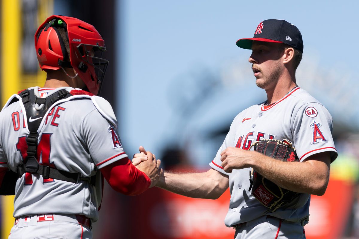 Jul 26, 2026; San Francisco, California, USA; Los Angeles Angels catcher Logan O'Hoppe (14) and pitcher Mitch Farris (70) celebrate defeating the San Francisco Giants at Oracle Park. Mandatory Credit: D. Ross Cameron-Imagn Images Jul 26, 2026; San Francisco, California, USA; Los Angeles Angels catcher Logan O'Hoppe (14) and pitcher Mitch Farris (70) celebrate defeating the San Francisco Giants at Oracle Park. Mandatory Credit: D. Ross Cameron-Imagn Images