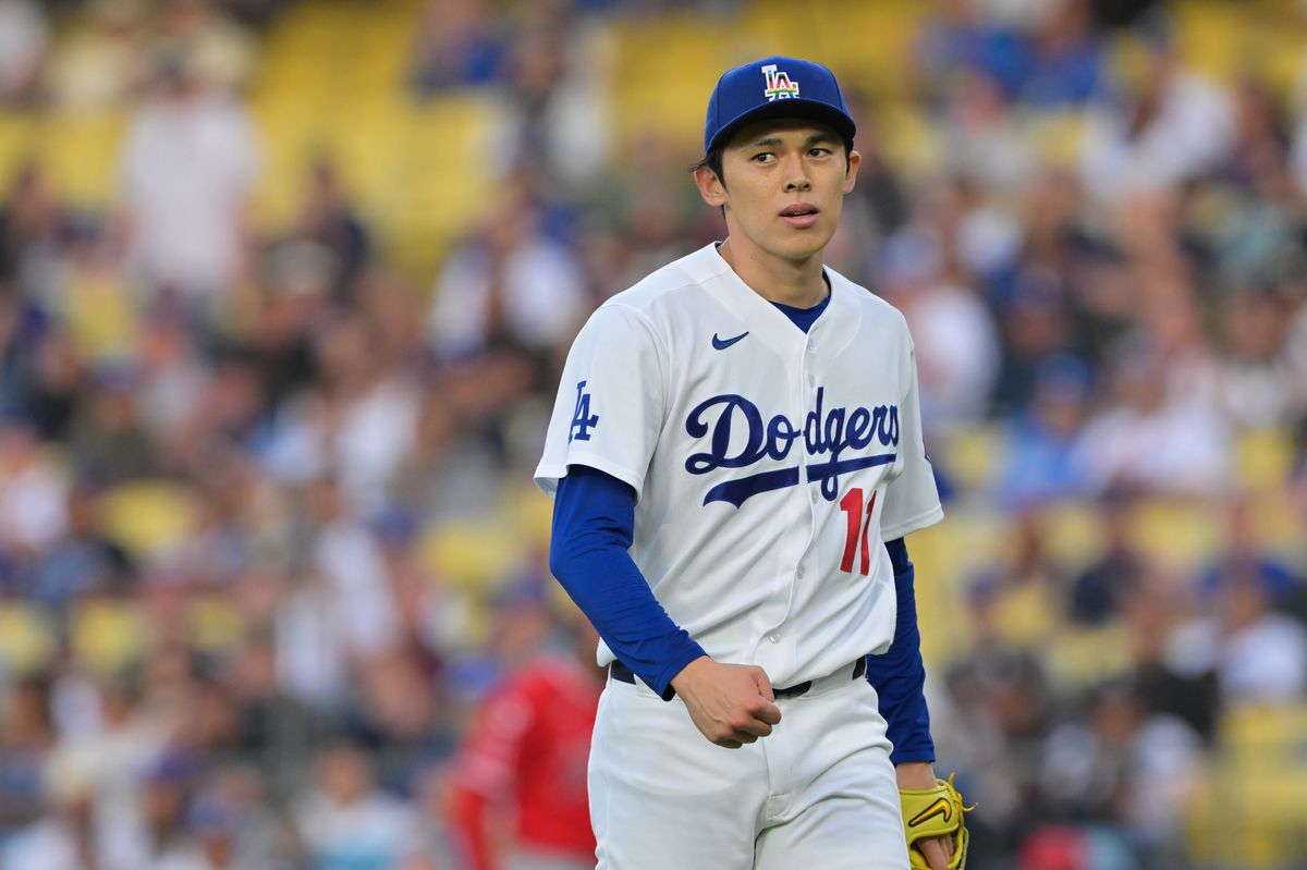 Los Angeles Dodgers pitcher Roki Sasaki (11) walks off the mound during the first inning against the Los Angeles Angels at Dodger Stadium. 