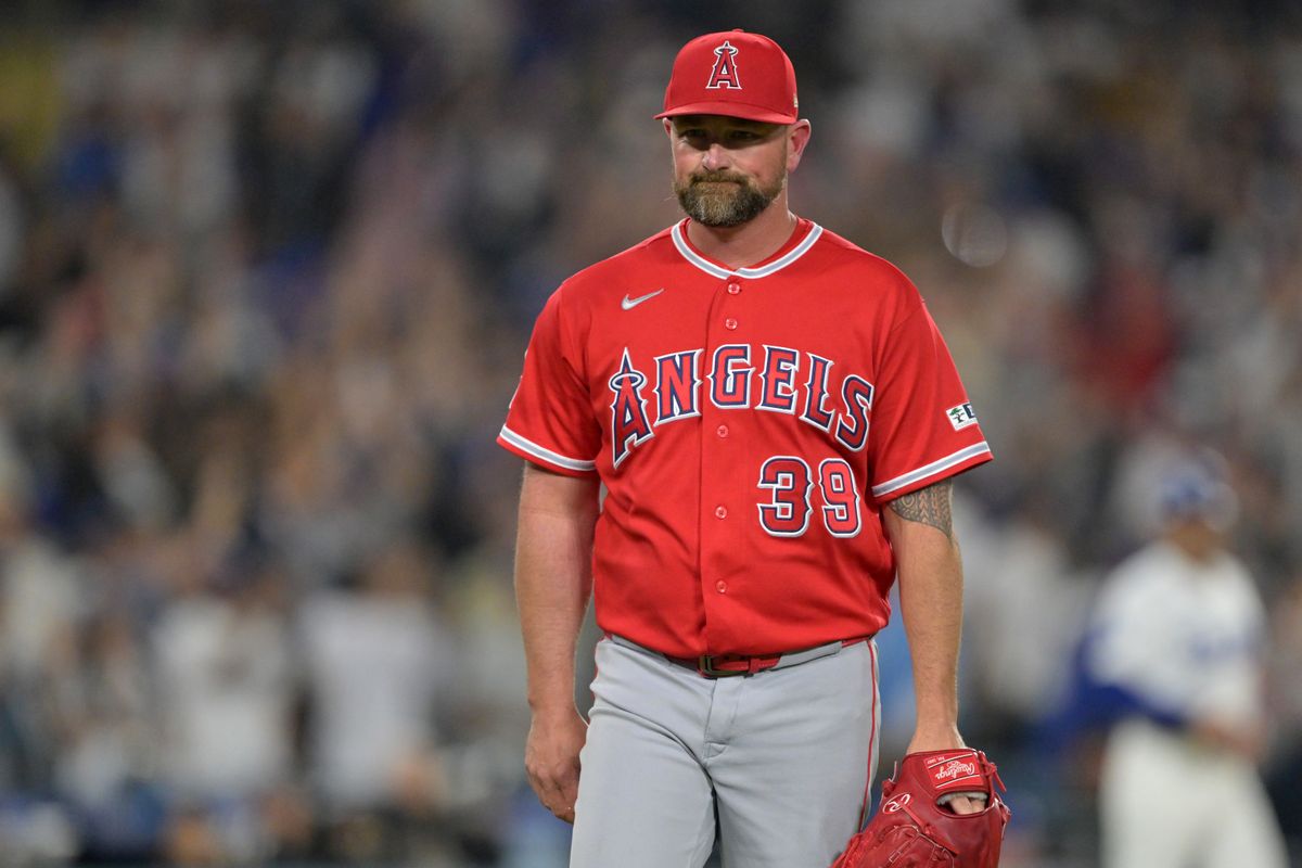 Los Angeles Angels relief pitcher Kirby Yates (39) walks to the dugout after giving up a walk-off solo home run to Los Angeles Dodgers first baseman Freddie Freeman (5) in the ninth inning against the Los Angeles Angels at Dodger Stadium. 