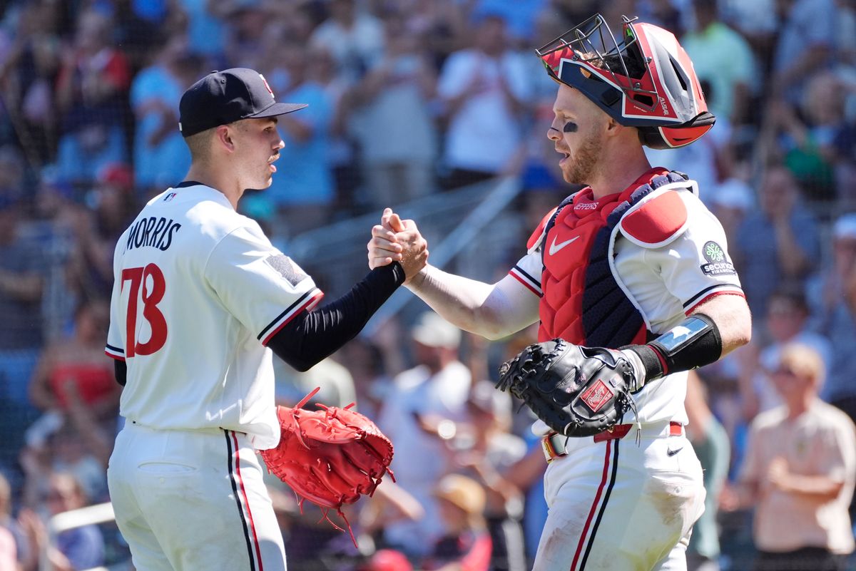 Jul 12, 2026; Minneapolis, Minnesota, USA; Minnesota Twins relief pitcher Andrew Morris (78) celebrates with catcher Ryan Jeffers (27) the win over the Los Angeles Angels after the game at Target Field. Mandatory Credit: Bruce Kluckhohn-Imagn Images Jul 12, 2026; Minneapolis, Minnesota, USA; Minnesota Twins relief pitcher Andrew Morris (78) celebrates with catcher Ryan Jeffers (27) the win over the Los Angeles Angels after the game at Target Field. Mandatory Credit: Bruce Kluckhohn-Imagn Images