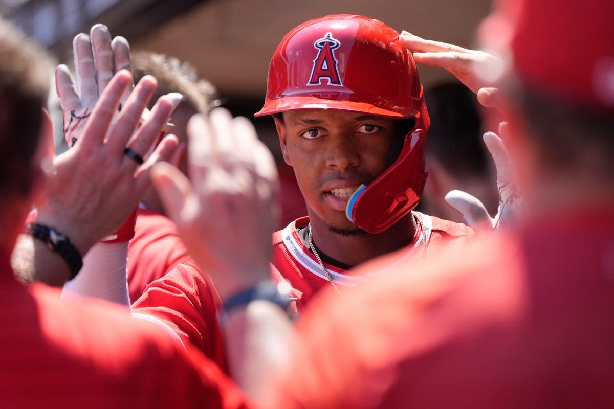 Jul 12, 2026; Minneapolis, Minnesota, USA; Los Angeles Angels third baseman Denzer Guzman (23) celebrates his solo home run against the Minnesota Twins in the seventh inning at Target Field. Mandatory Credit: Bruce Kluckhohn-Imagn Images Jul 12, 2026; Minneapolis, Minnesota, USA; Los Angeles Angels third baseman Denzer Guzman (23) celebrates his solo home run against the Minnesota Twins in the seventh inning at Target Field. Mandatory Credit: Bruce Kluckhohn-Imagn Images