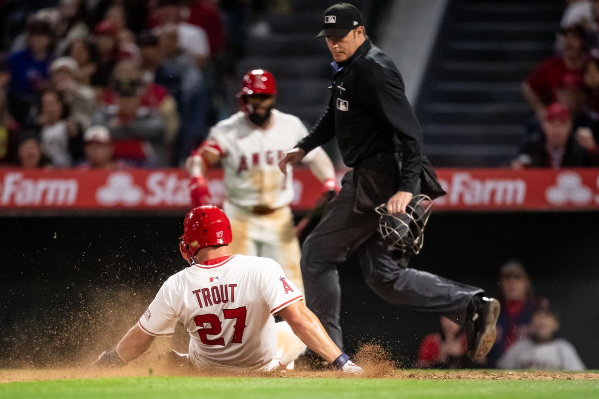Los Angeles Angels outfielder Mike Trout (27)slides into home during the game against the Cleveland Guardians on Friday, April 4th, 2025, at Angel Stadium in Anaheim, CA.