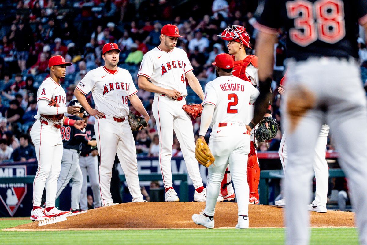 Los Angeles Angels come together on the mound to settle the pitcher down during the game against the Cleveland Guardians on Saturday, April 5th, 2025, at Angel Stadium in Anaheim, CA. Los Angeles Angels come together on the mound to settle the pitcher down during the game against the Cleveland Guardians on Saturday, April 5th, 2025, at Angel Stadium in Anaheim, CA.