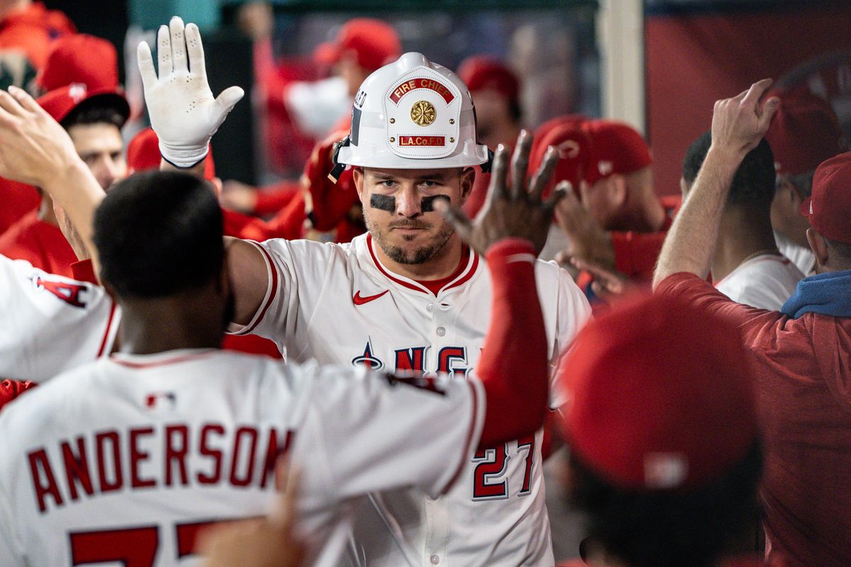 Los Angeles Angels OF Mike Trout (27) celebrates hitting a home run with his teammates during the game against the Cleveland Guardians on Saturday, April 5th, 2025, at Angel Stadium in Anaheim, CA. Los Angeles Angels OF Mike Trout (27) celebrates hitting a home run with his teammates during the game against the Cleveland Guardians on Saturday, April 5th, 2025, at Angel Stadium in Anaheim, CA.