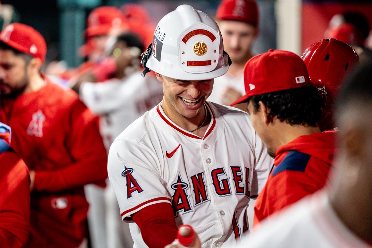 Los Angeles Angels C Logan O'Hoppe (14) celebrates hitting a home run with his teammates during the game against the Cleveland Guardians on Saturday, April 5th, 2025, at Angel Stadium in Anaheim, CA. Los Angeles Angels C Logan O'Hoppe (14) celebrates hitting a home run with his teammates during the game against the Cleveland Guardians on Saturday, April 5th, 2025, at Angel Stadium in Anaheim, CA.