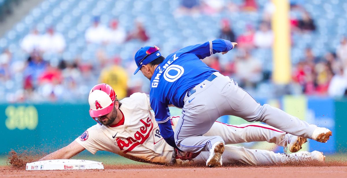 Los Angeles Angels infielder #18 Nolan Schanuel slides to second base against the Toronto Blue Jays on May 7, 2024 in Anaheim, CA.