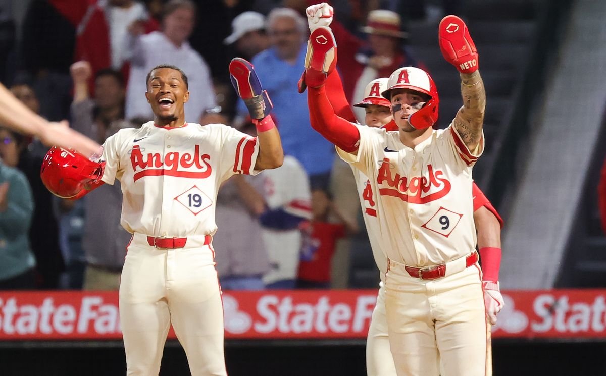 Los Angeles Angels #19 Kyren Paris and #9 Zach Neto celebrate their win at home plate against the Toronto Blue Jays on May 7, 2024 in Anaheim, CA. 