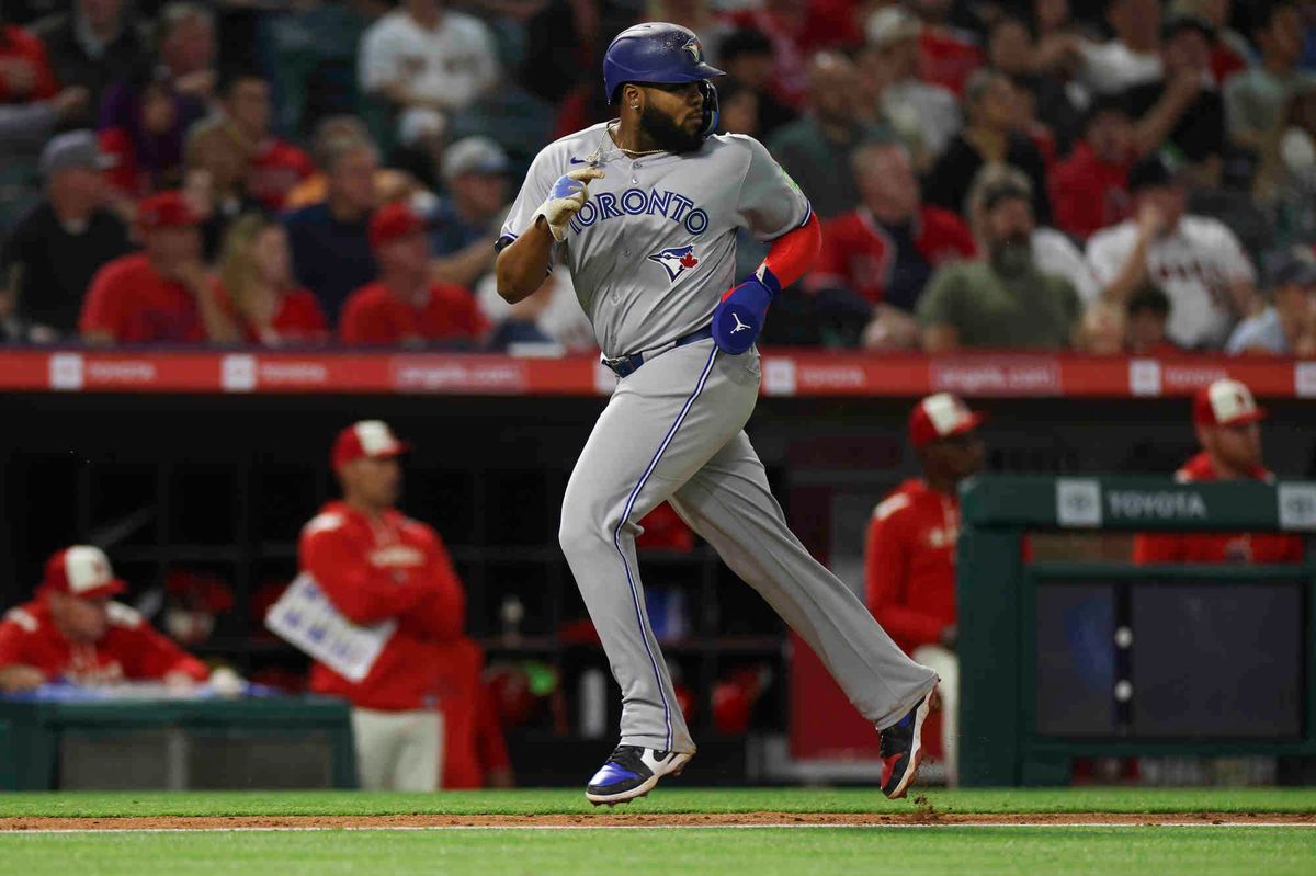 Vladimir Guerrero Jr. #27 of the Toronto Blue Jays jogs home to score a run during a game against the Los Angeles Angels at Angel Stadium of Anaheim on Thursday, May 8, 2025 in Anaheim, California.