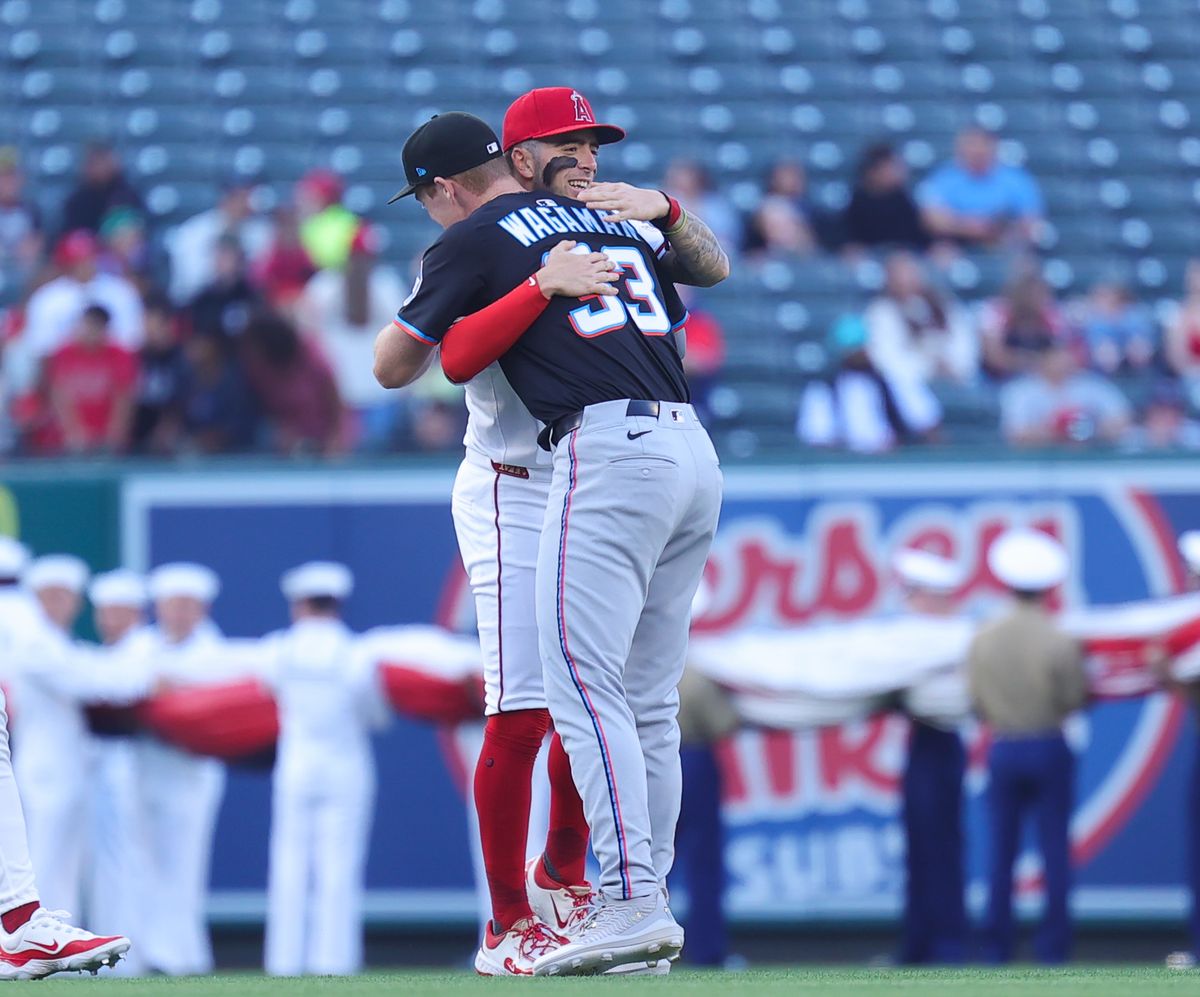 Los Angeles Angels infielder #9 Zach Neto greets Florida Marlins infielder #33 Eric Wagaman prior to an MLB game on May 24, 2025 in Anaheim, CA.