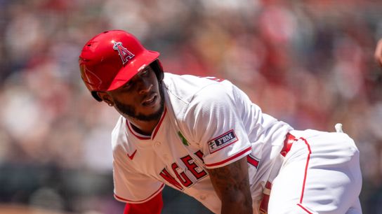 Los Angeles Angels batter, slides back into first after attempting to steal second during the game against the Miami Marlins on Sunday, May 25, 2025, at Angel Stadium in Anaheim, CA.