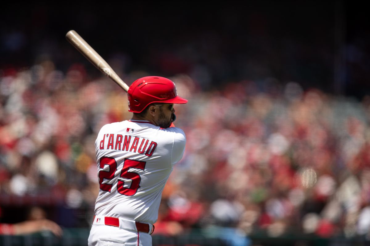 Los Angeles Angels catcher Travis d'Arnaud (25) on deck during the game against the Miami Marlins on Sunday, May 25, 2025, at Angel Stadium in Anaheim, CA.