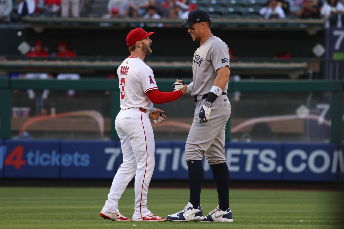 Los Angeles Angels outfielder Taylor Ward (3) talks with New York Yankees outfielder Aaron Judge (99) before the MLB game Wednesday May 28th, 2025 at Angel's Stadium in Anaheim, Calif.