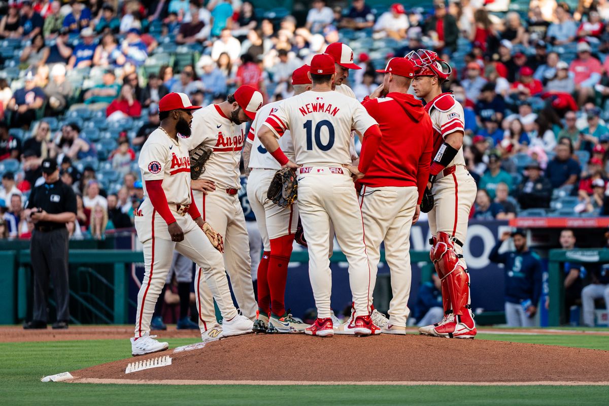 Los Angeles Angels team talks to the pitcher during a game against the Seattle Mariners Saturday June 7th, 2025 at Angel's Stadium in Anaheim, Calif.