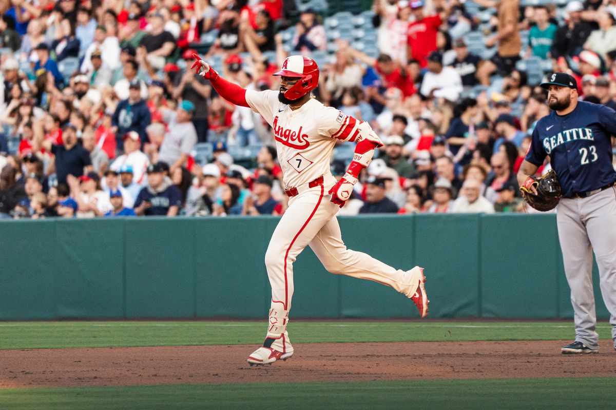 Los Angeles Angels OF Jo Adell (7) round the bases and celebrates a home run during a game against the Seattle Mariners Saturday June 7th, 2025 at Angel's Stadium in Anaheim, Calif.