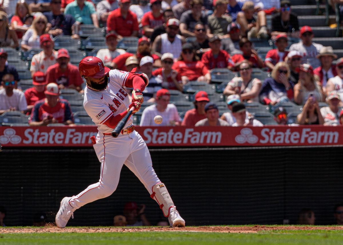 Los Angeles Angels' Outfielder, Jo Adell 7, swings and hits a ground ball during an MLB baseball game against the Athletics on June 11, 2025 in Anaheim, CA.