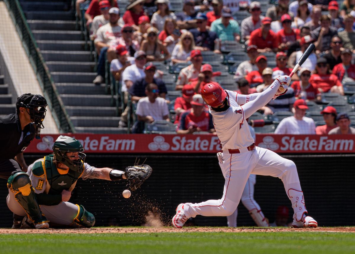 Los Angeles Angels' Outfielder, Jo Adell 7, swings and hits a foul ball into the dirt during an MLB baseball game against the Athletics on June 11, 2025 in Anaheim, CA.