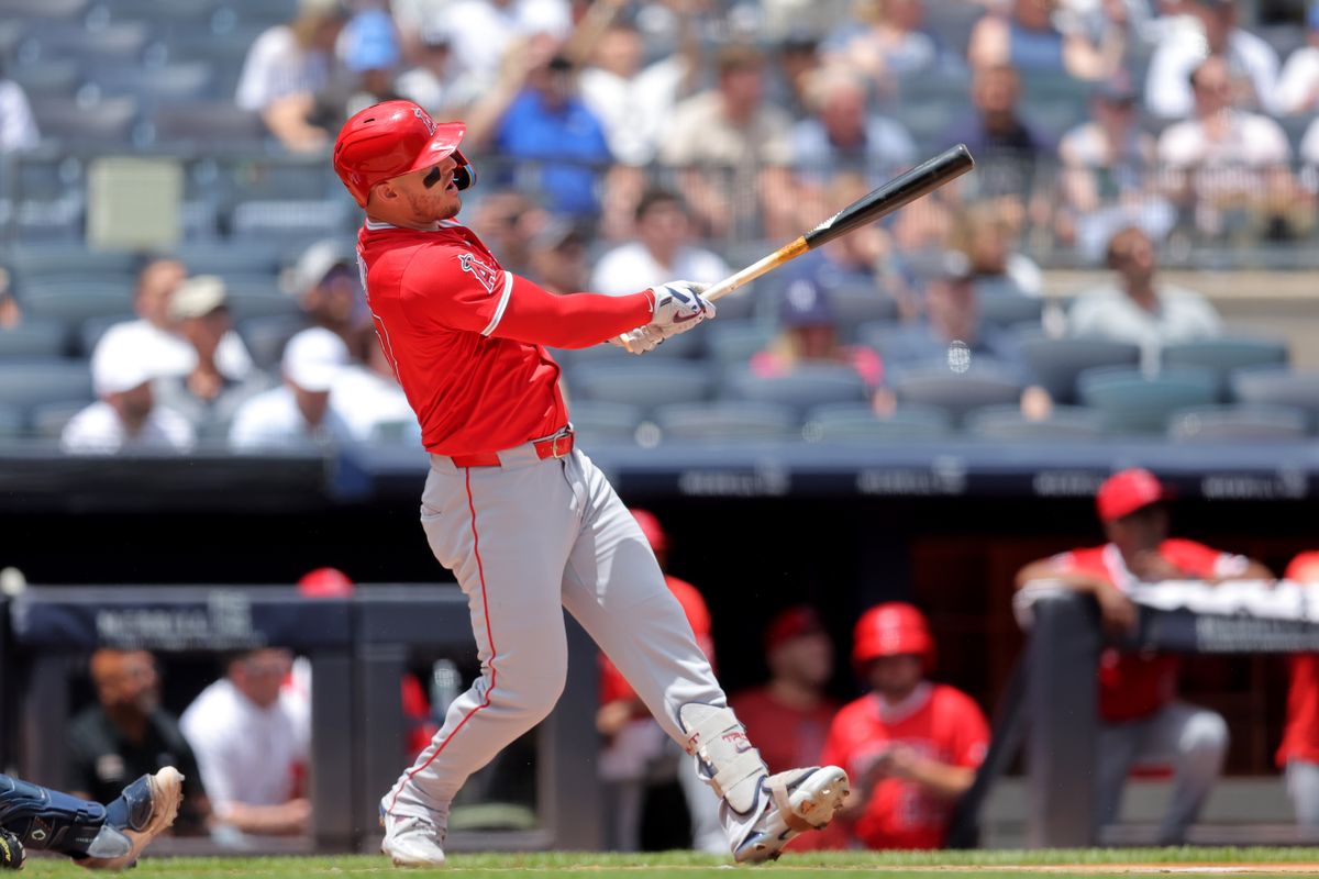 Los Angeles Angels right fielder Mike Trout (27) follows through on a solo home run against the New York Yankees during the first inning at Yankee Stadium.
