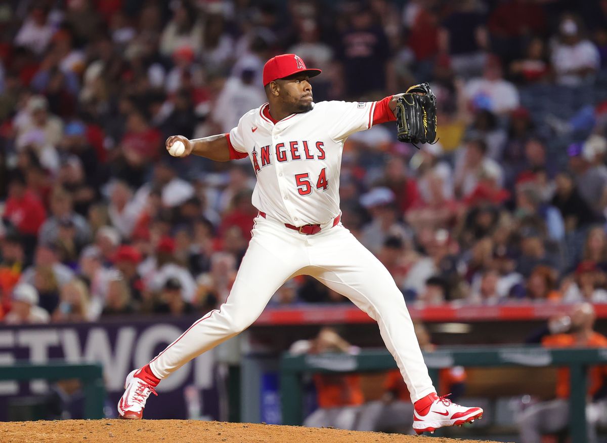 Los Angeles Angels closer #54 Hector Neris throws a pitch during an MLB game against the Houston Astros on June 21, 2025 in Anaheim, CA.
