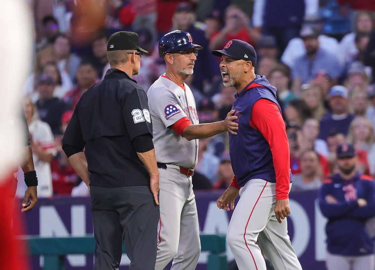 Boston Red Sox manager Alex Cora argues with an umpire during an MLB game against the Los Angeles Angels on June 23, 2025 in Anaheim, CA.