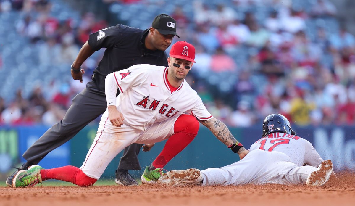 Los Angeles Angels infielder #9 Zach Neto makes a tag at second base during an MLB game against the Boston Red Sox on June 23, 2025 in Anaheim, CA.
