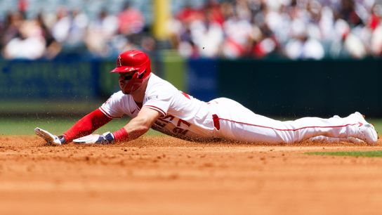 Mike Trout #27 of the Los Angeles Angels slides into second base during the game against the Boston Red Sox at Angel Stadium of Anaheim on June 25, 2025 in Anaheim, California.