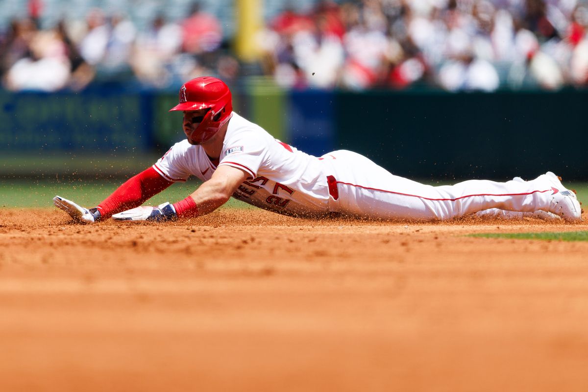 Mike Trout #27 of the Los Angeles Angels slides into second base during the game against the Boston Red Sox at Angel Stadium of Anaheim on June 25, 2025 in Anaheim, California. Mike Trout #27 of the Los Angeles Angels slides into second base during the game against the Boston Red Sox at Angel Stadium of Anaheim on June 25, 2025 in Anaheim, California.