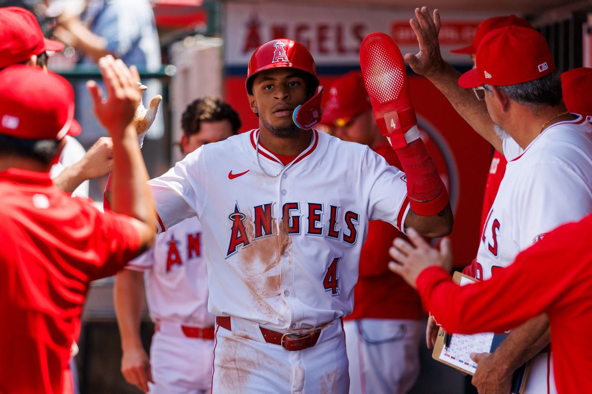 Christian Moore #4 of the Los Angeles Angels celebrates in the dugout during the game against the Boston Red Sox at Angel Stadium of Anaheim on June 25, 2025 in Anaheim, California. Christian Moore #4 of the Los Angeles Angels celebrates in the dugout during the game against the Boston Red Sox at Angel Stadium of Anaheim on June 25, 2025 in Anaheim, California.