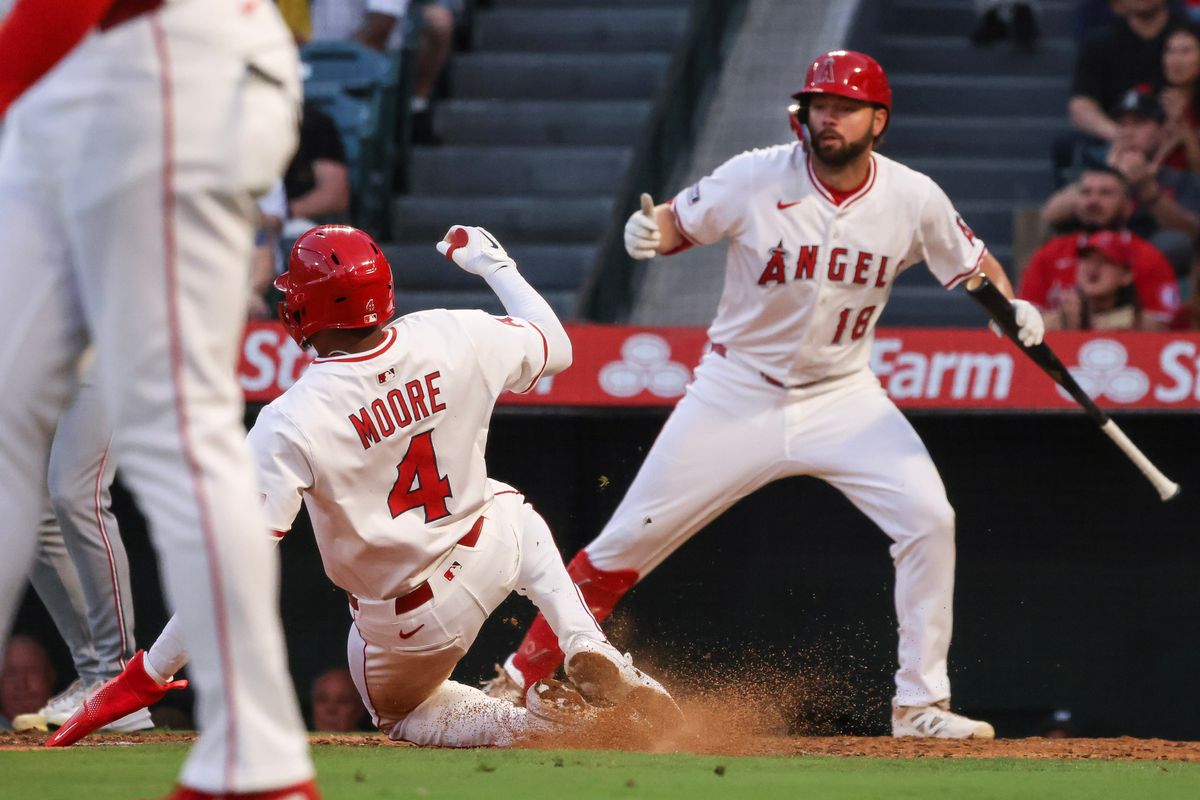 Los Angeles Angels infielder Christian Moore (4) slides into home plate to score a run during the MLB game against the Washington Nationals Friday June 27th, 2025 at Angel's Stadium in Anaheim, Calif. Los Angeles Angels infielder Christian Moore (4) slides into home plate to score a run during the MLB game against the Washington Nationals Friday June 27th, 2025 at Angel's Stadium in Anaheim, Calif.