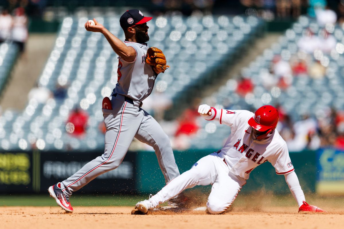 Christian Moore #4 of the Los Angeles Angels slides into second base during the game against the Washington Nationals at Angel Stadium of Anaheim on June 29, 2025 in Anaheim, California. Christian Moore #4 of the Los Angeles Angels slides into second base during the game against the Washington Nationals at Angel Stadium of Anaheim on June 29, 2025 in Anaheim, California.
