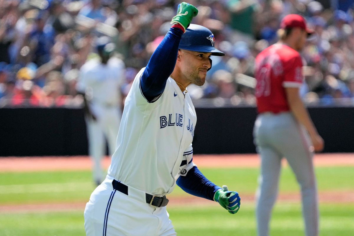 Toronto Blue Jays left fielder George Springer (4) reacts as he runs to first base on his two run home run against the Los Angeles Angels during the third inning at Rogers Centre. Toronto Blue Jays left fielder George Springer (4) reacts as he runs to first base on his two run home run against the Los Angeles Angels during the third inning at Rogers Centre.