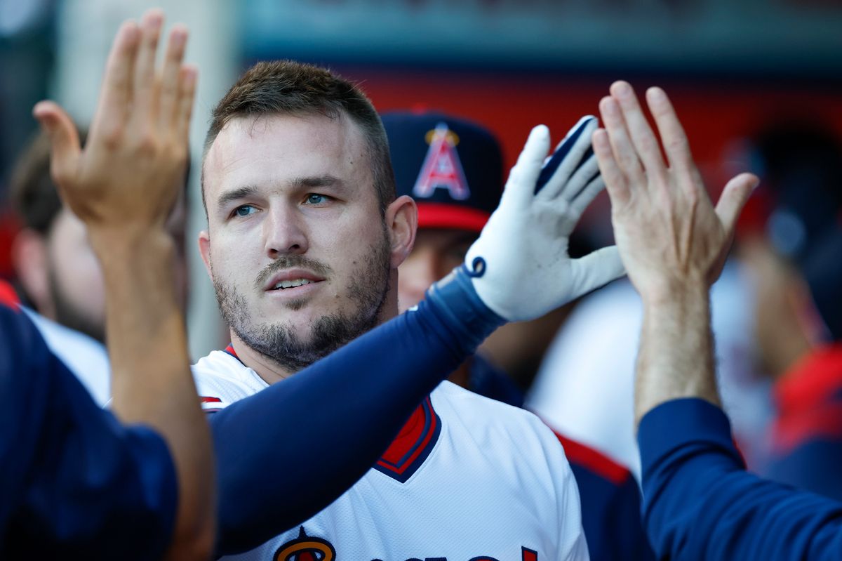 Mike Trout #27 of the Los Angeles Angels celebrates after hitting an RBI sacrifice fly in the first inning during a game against the Texas Rangers at Angel Stadium on July 7, 2025, in Anaheim, California. Mike Trout #27 of the Los Angeles Angels celebrates after hitting an RBI sacrifice fly in the first inning during a game against the Texas Rangers at Angel Stadium on July 7, 2025, in Anaheim, California.