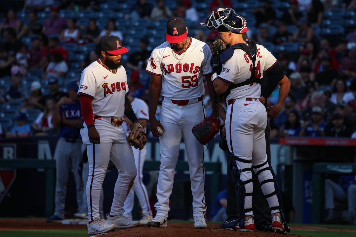 Los Angeles Angels right handed pitcher José Soriano (59) talks with his teammates during the MLB game against the Texas Rangers Tuesday July 8th, 2025 at Angel's Stadium in Anaheim, Calif.