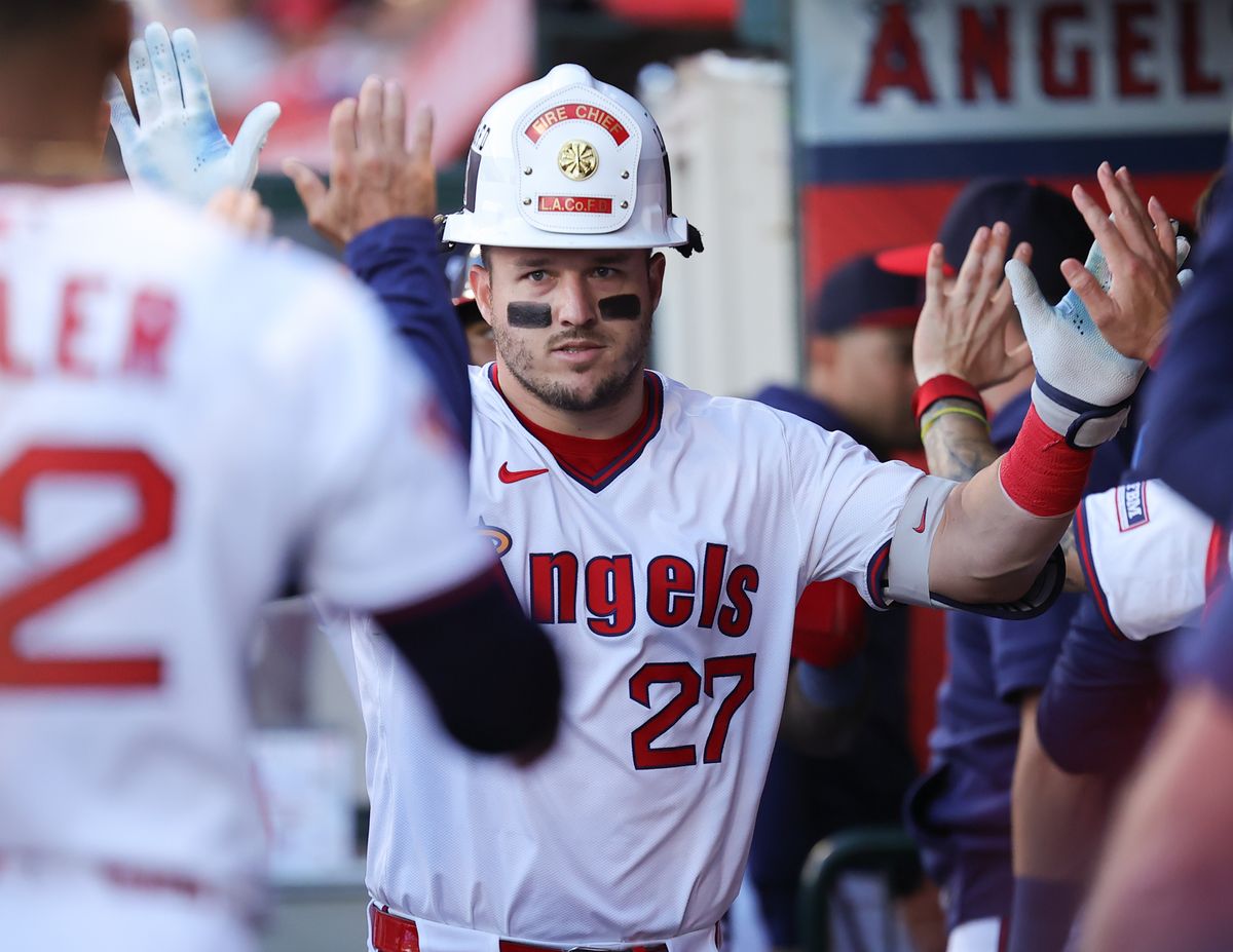 #27 Mike Trout of the Los Angeles Angels celebrates a home run against the Texas Rangers on July 9, 2025 in Anaheim, CA.
