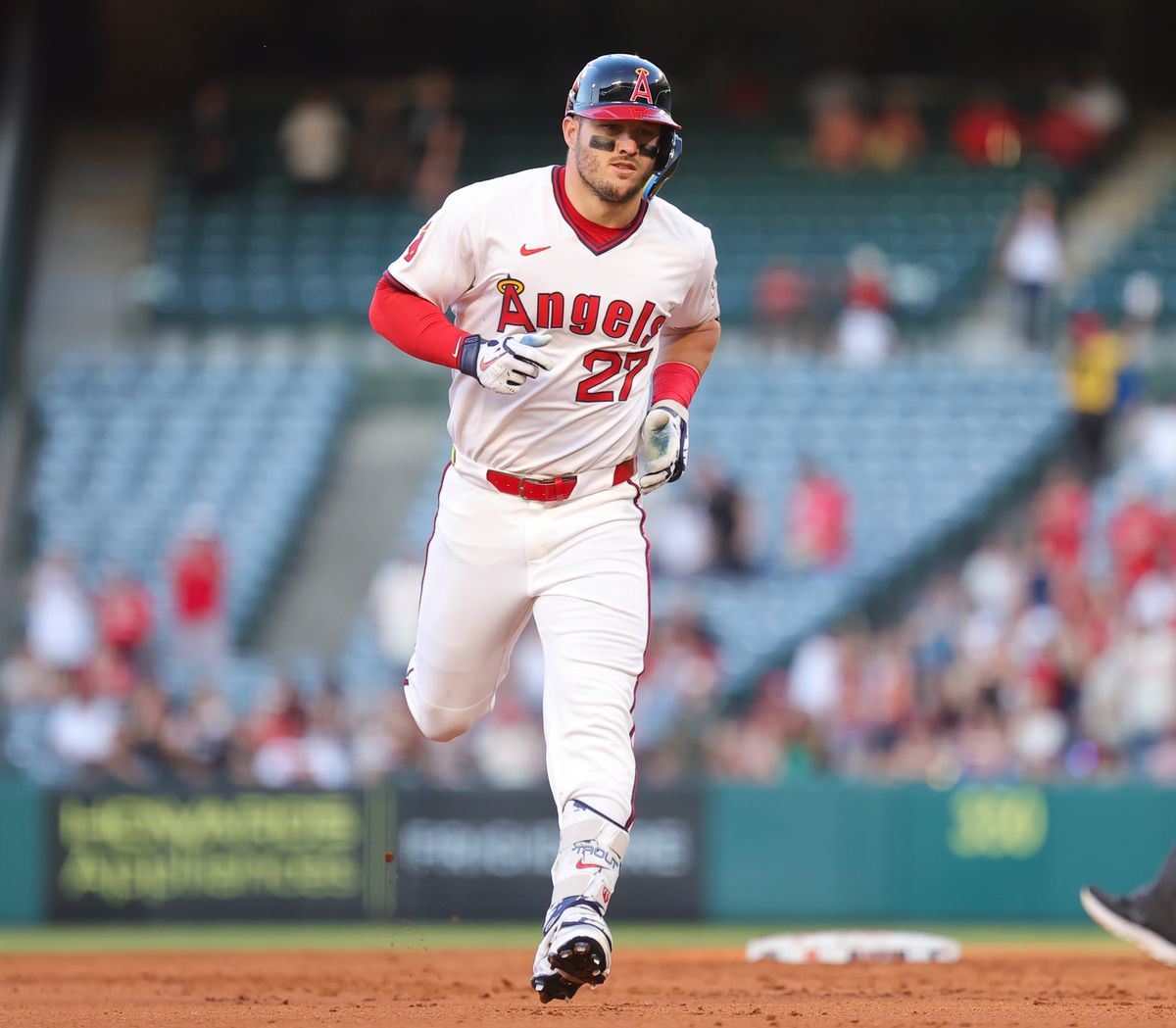 #27 Mike Trout of the Los Angeles Angels rounds the bases after a home run against the Texas Rangers on July 9, 2025 in Anaheim, CA.