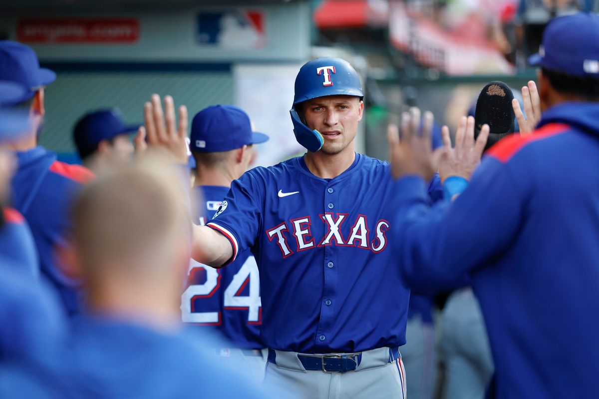 Corey Seager #5 of the Texas Rangers celebrates scoring a run in the first inning during a game against the Los Angeles Angels at Angel Stadium on July 10, 2025, in Anaheim, California. Corey Seager #5 of the Texas Rangers celebrates scoring a run in the first inning during a game against the Los Angeles Angels at Angel Stadium on July 10, 2025, in Anaheim, California.