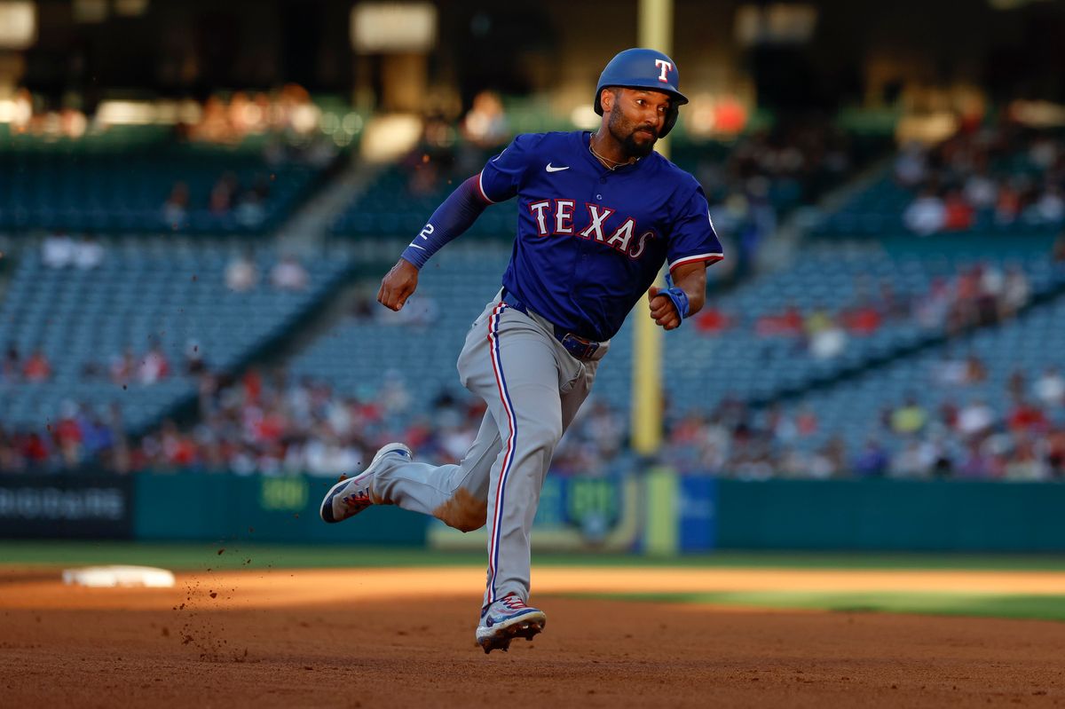 Marcus Semien #2 of the Texas Rangers runs to third base during a game against the Los Angeles Angels at Angel Stadium on July 10, 2025, in Anaheim, California. Marcus Semien #2 of the Texas Rangers runs to third base during a game against the Los Angeles Angels at Angel Stadium on July 10, 2025, in Anaheim, California.