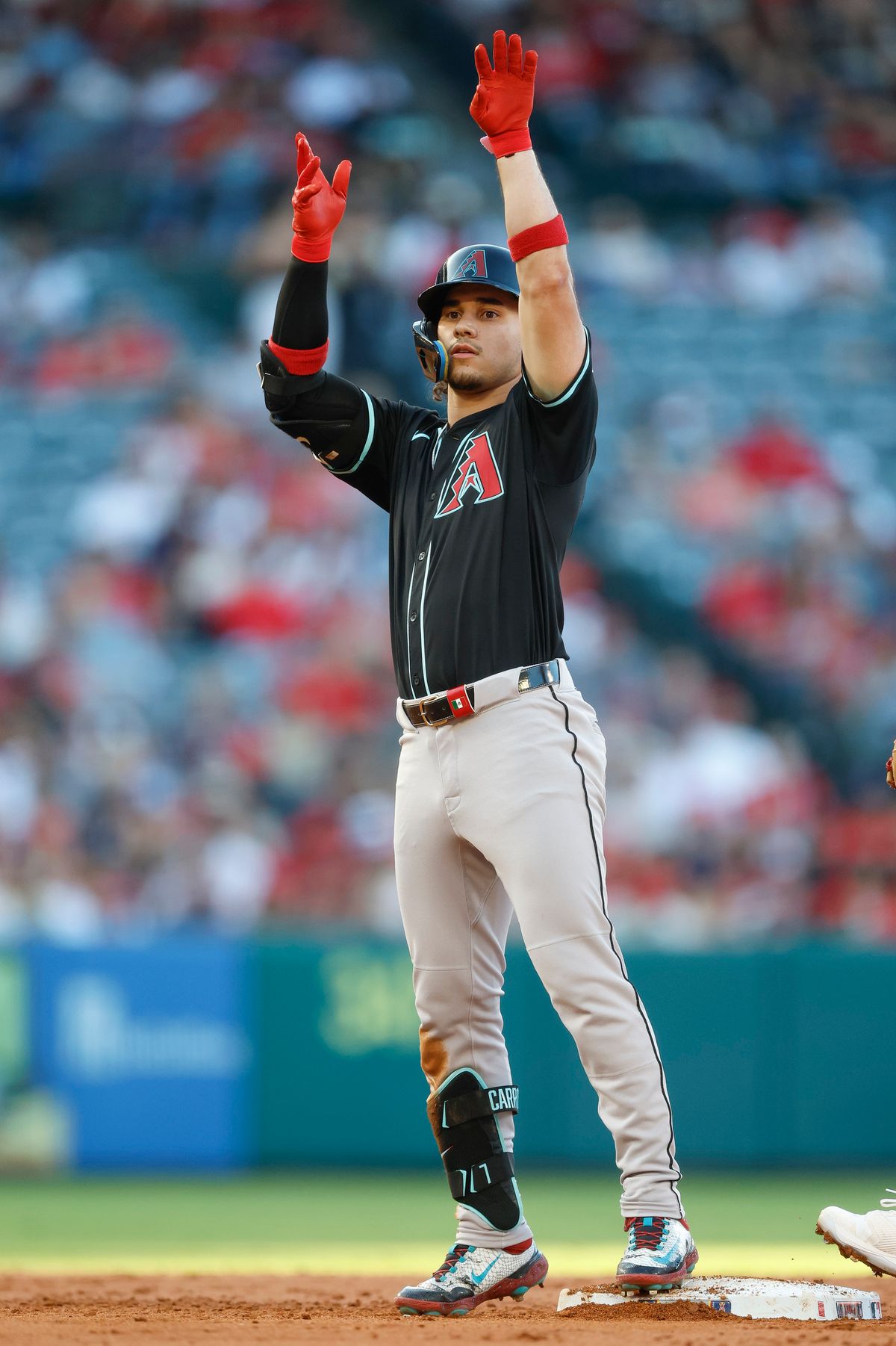 Alek Thomas #5 of the Arizona Diamondbacks celebrates an RBI double during a game against the Los Angeles Angels at Angel Stadium on July 11, 2025, in Anaheim, California.