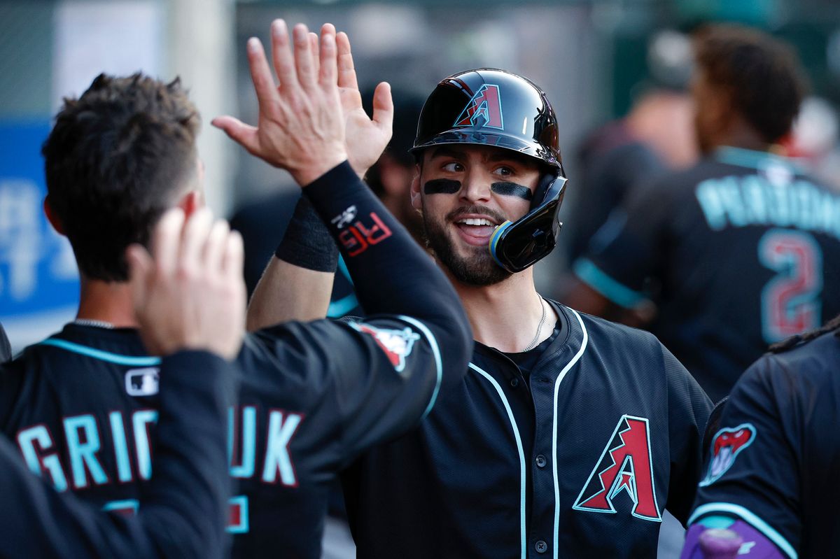 Blaze Alexander #9 of the Arizona Diamondbacks celebrates scoring a run during a game against the Los Angeles Angels at Angel Stadium on July 11, 2025, in Anaheim, California.