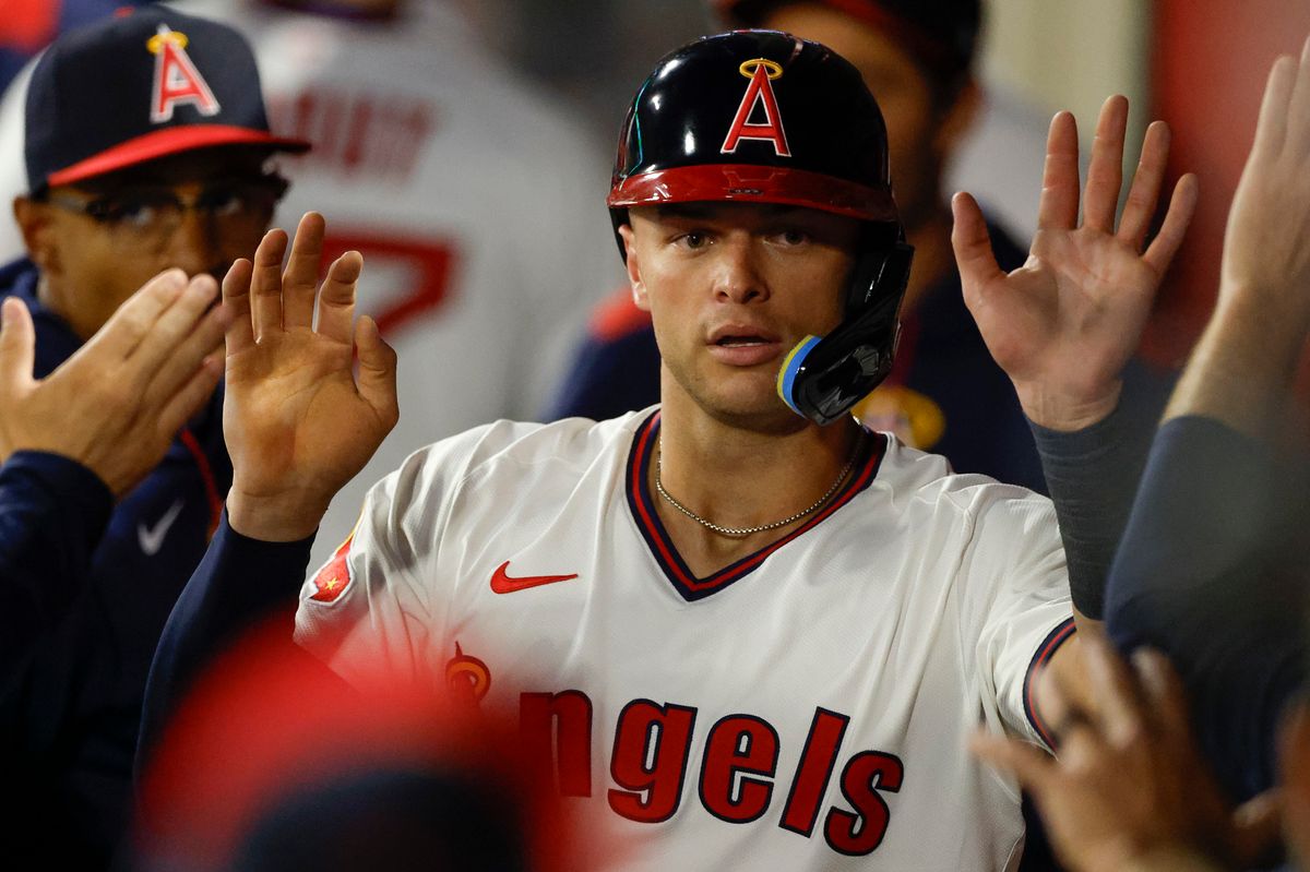 Logan O'Hoppe #14 of the Los Angeles Angels celebrates scoring a run during a game against the Arizona Diamondbacks at Angel Stadium on July 11, 2025, in Anaheim, California.