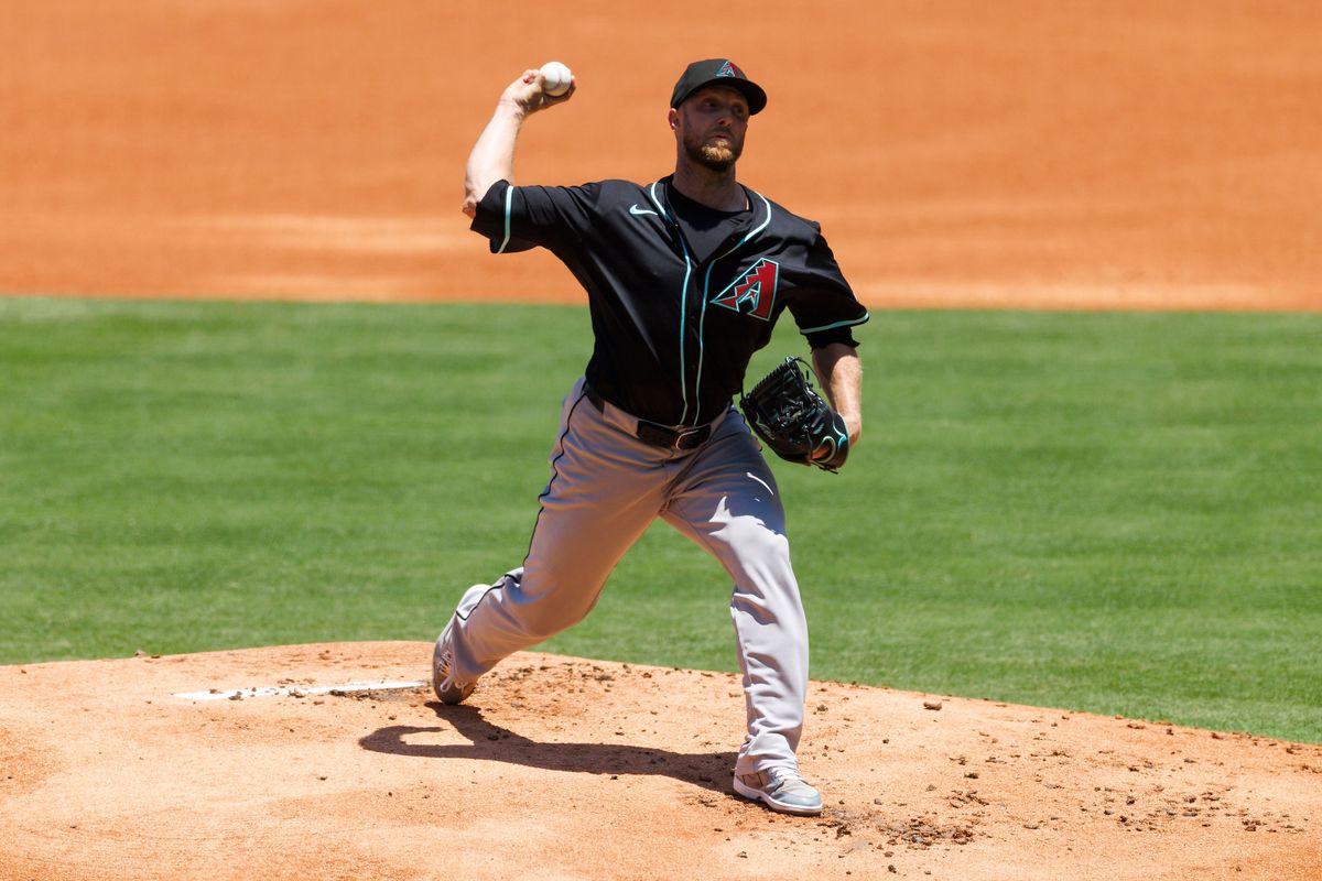 Merrill Kelly #29 of the Arizona Diamondbacks itches during the game against the Los Angeles Angels at Angel Stadium of Anaheim on July 13, 2025 in Anaheim, California. Merrill Kelly #29 of the Arizona Diamondbacks itches during the game against the Los Angeles Angels at Angel Stadium of Anaheim on July 13, 2025 in Anaheim, California.