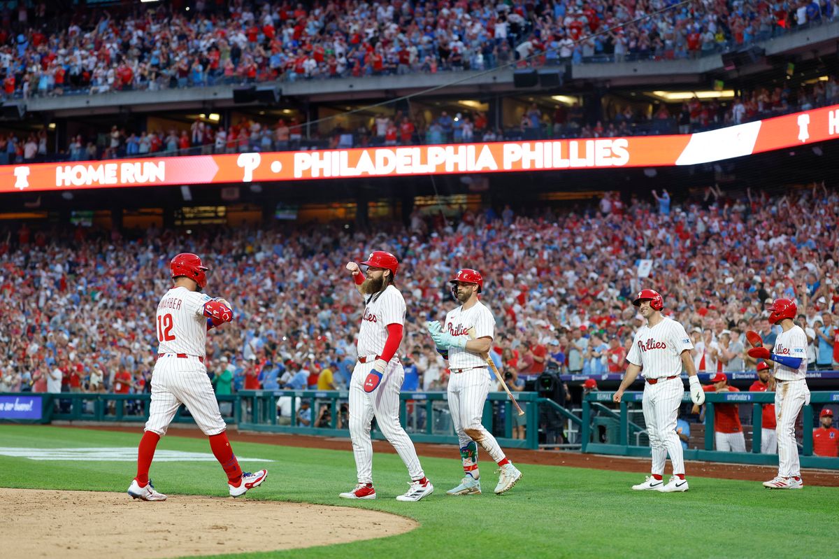 Kyle Schwarber #12 of the Philadelphia Phillies celebrates a grand slam during a game against the Los Angeles Angels at Citizens Bank Park on July 19, 2025, in Philadelphia, Pennsylvania.