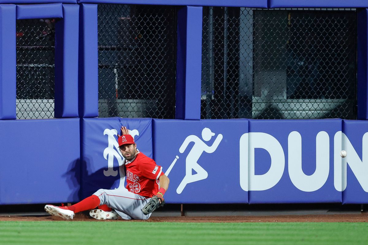 Chris Taylor #33 of the Los Angeles Angels misses a catch against the New York Mets at Citi Field on July 21, 2025 in Flushing, NY.