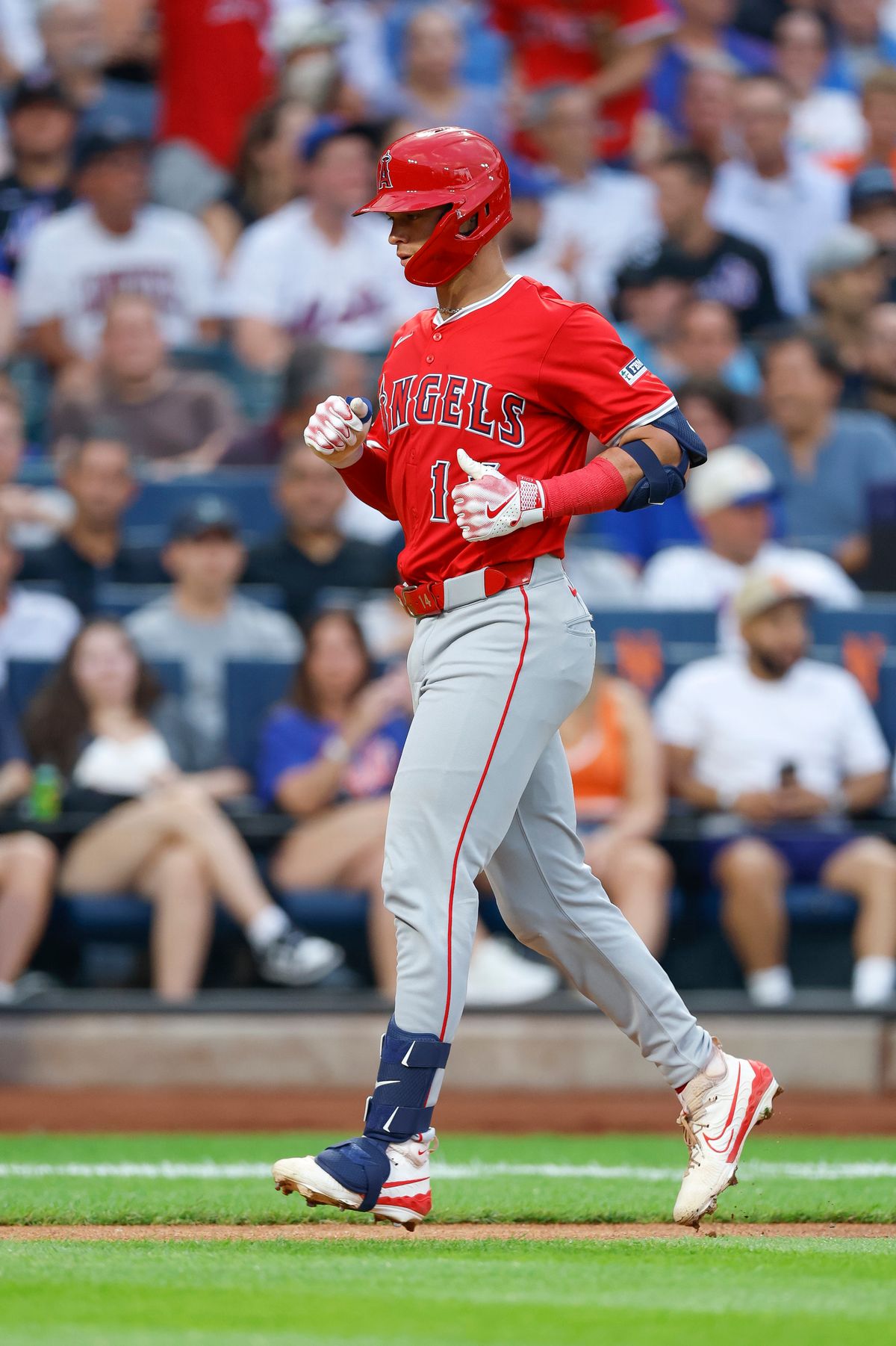 Logan O'Hoppe #14 of the Los Angeles Angels hits a solo home run against the New York Mets at Citi Field on July 21, 2025 in Flushing, NY.