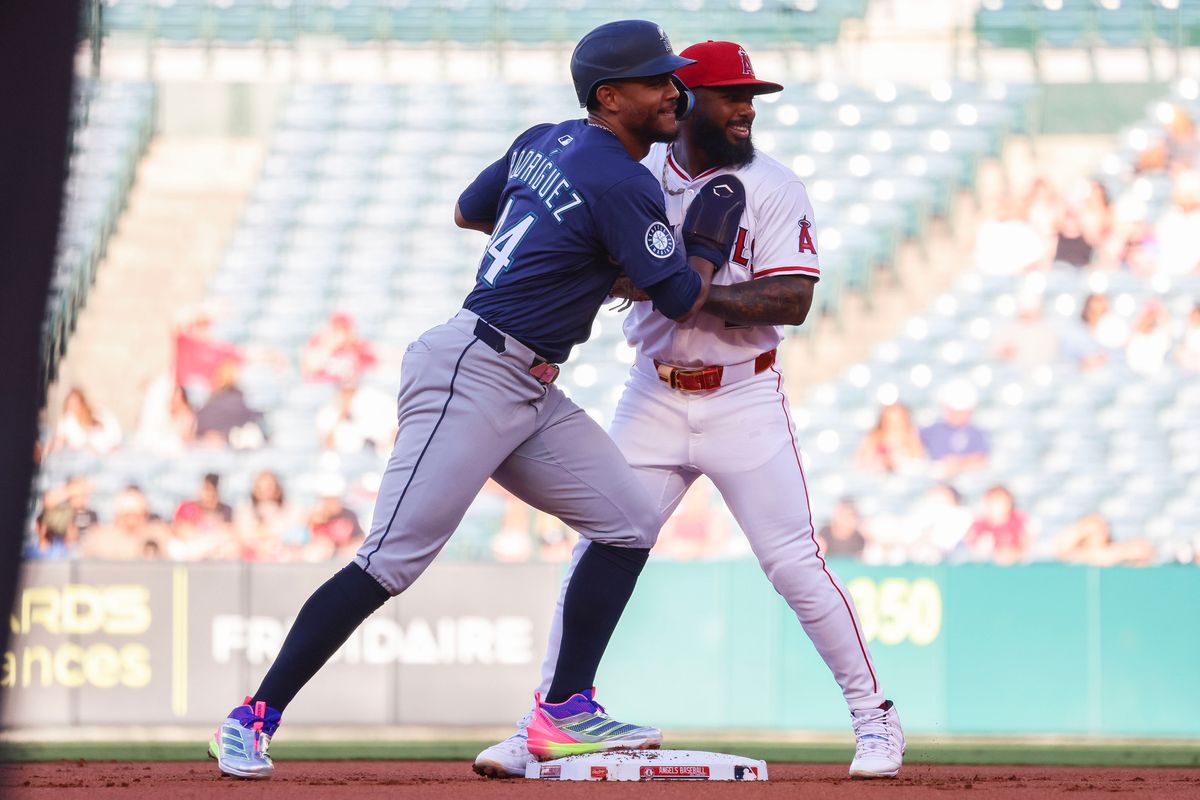 Los Angeles Angels infielder Luis Rengifo (2) and Seattle Mariners outfielder Julio Rodríguez (44) at second base during the MLB game Thursday July 24th, 2025 at Angel's Stadium in Anaheim, Calif.