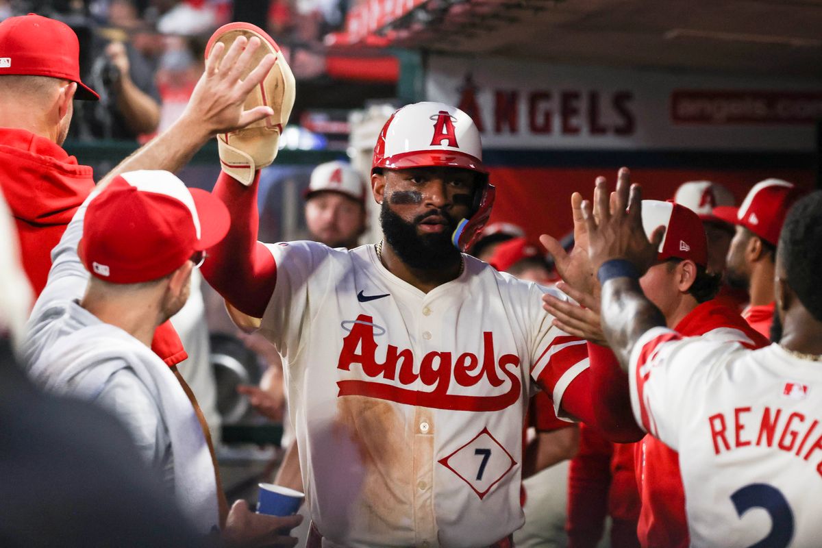 Los Angeles Angels outfielder Jo Adell (7) celebrates after scoring a run during the MLB game against the Texas Rangers Tuesday July 29th, 2025 at Angel's Stadium in Anaheim, Calif.